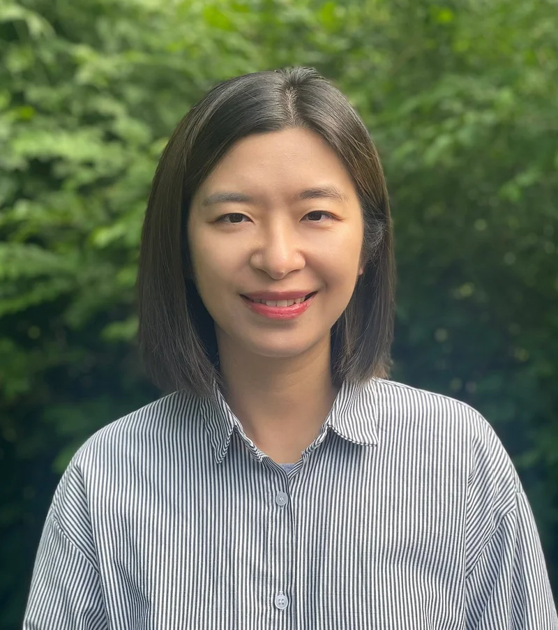 Portrait of Songqin Wei outdoors